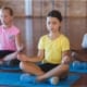 Many of us know that there are plenty of benefits of yoga for kids. But... what does the research say? Inquiring minds want to know! Here are 5 evidence-based benefits of yoga for kids.