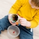 This homemade peg board activity encourages children to practice their fine motor coordination skills. Colorful and fun DIY toy.