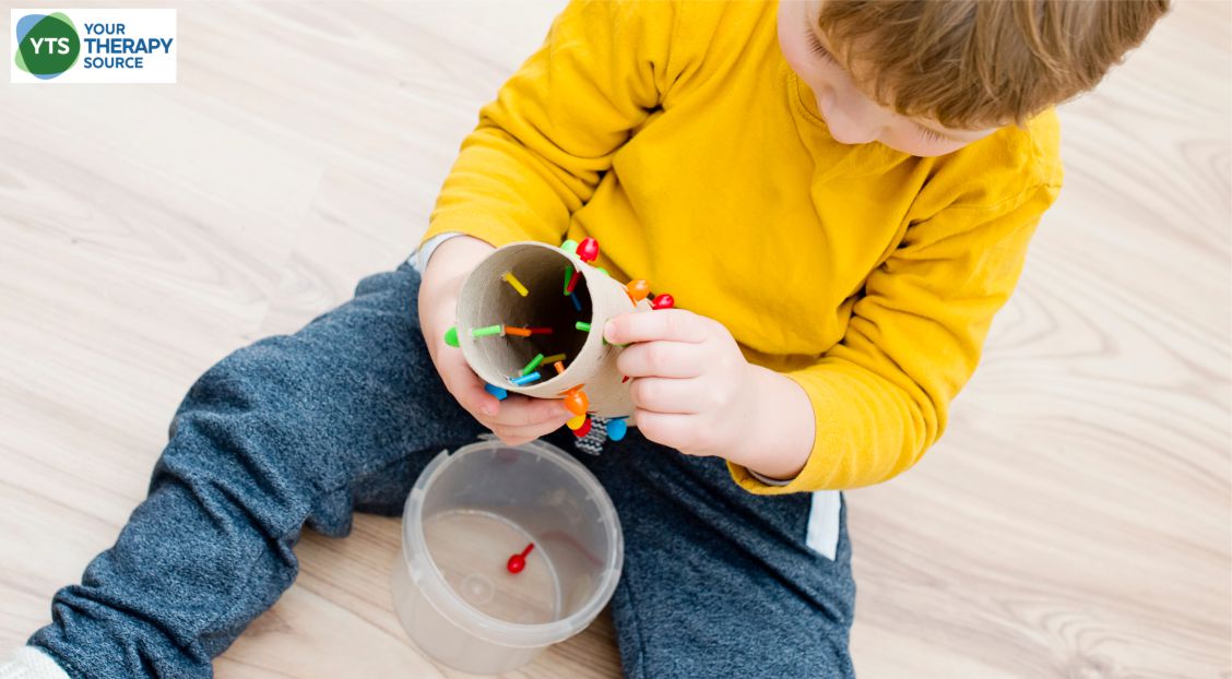 This homemade peg board activity encourages children to practice their fine motor coordination skills. Colorful and fun DIY toy.