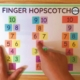 This FREE fine motor exercise - Finger Hopscotch is a no-prep, fun game to play! You can download the free printable at the bottom of the post.